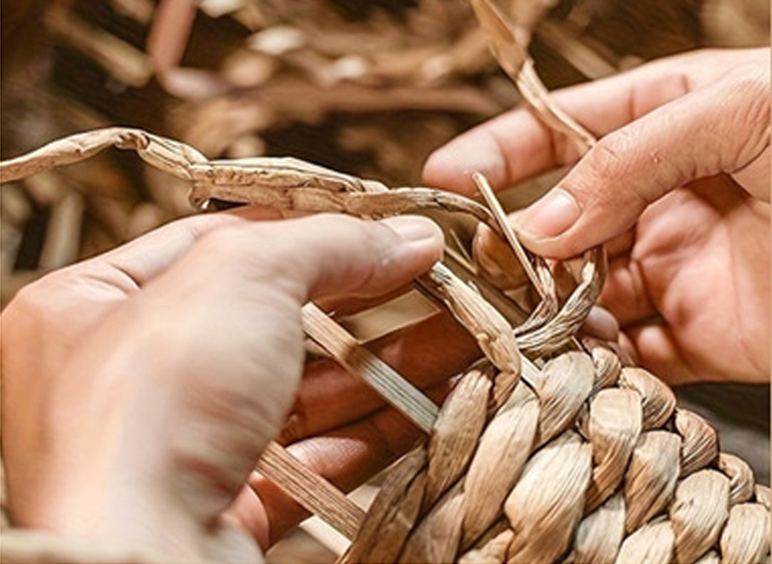 Handwoven water hyacinth craftsmanship showing natural texture, sustainable fibers, and detailed basket weaving