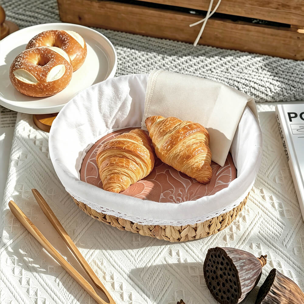 Bread basket styled in a warm dining scene, showcasing natural woven texture and everyday table use
